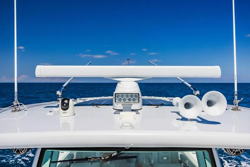 Slide: The Image of Rooftop equipment on 2023 HCB 53 Suenos boat against clear blue ocean backdrop. - 52