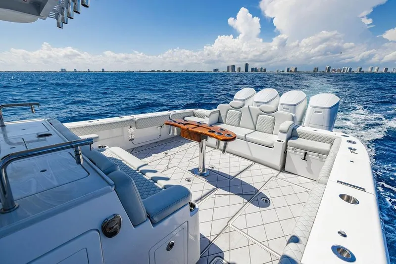 Slide: The Image of Luxurious 2023 HCB 53 Suenos boat interior with ocean view and city skyline. - 82