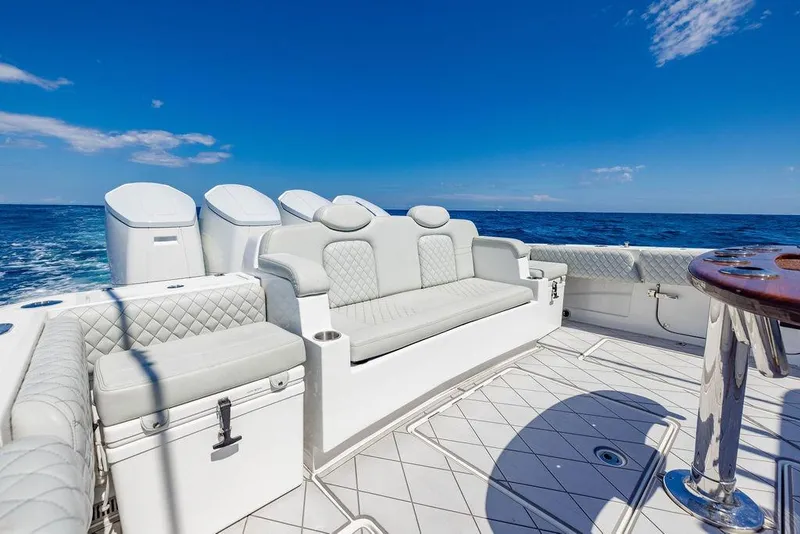 Slide: The Image of Luxurious seating on 2023 HCB 53 Suenos boat with ocean backdrop. - 91