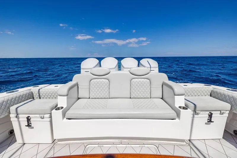 Slide: The Image of 2023 HCB 53 Suenos luxury boat seating with ocean backdrop. - 92
