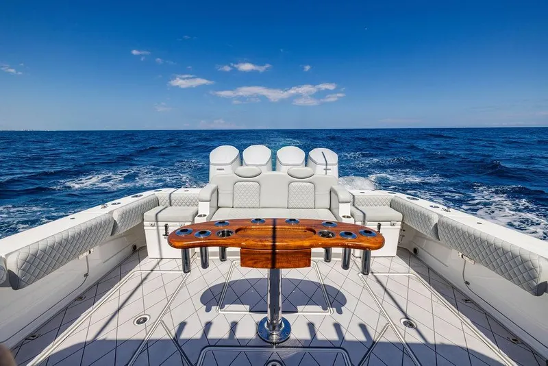 Slide: The Image of Luxury HCB 53 Suenos yacht deck with seating and ocean view, 2023 model. - 93