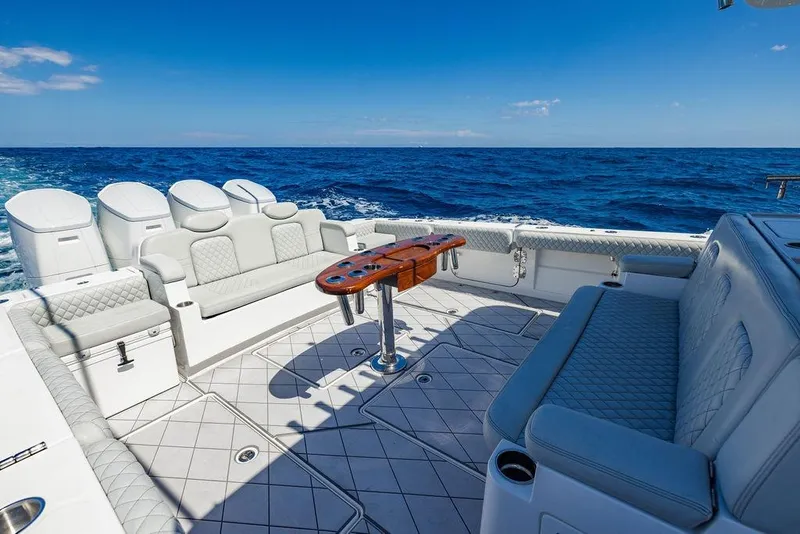 Slide: The Image of Luxurious 2023 HCB 53 Suenos yacht interior with plush seating and ocean view. - 94