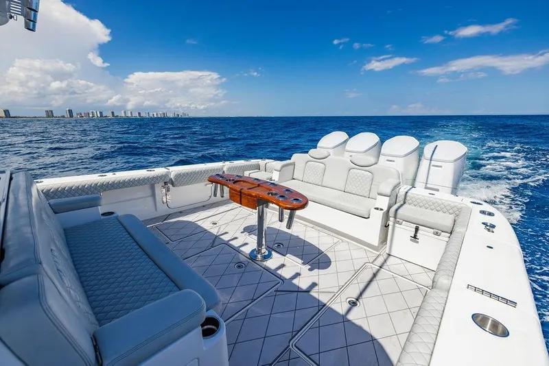 Slide: The Image of Luxurious 2023 HCB 53 Suenos yacht interior with ocean view and city skyline. - 95