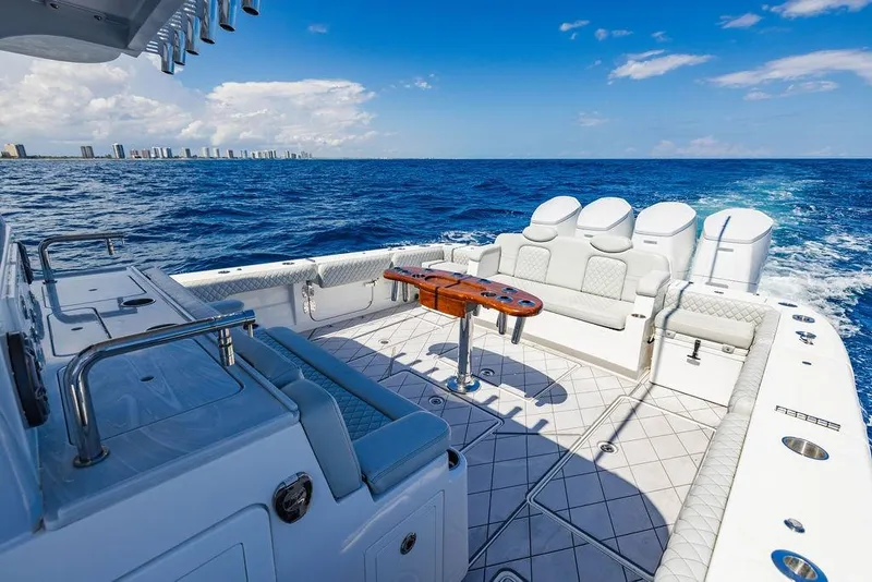 Slide: The Image of Luxurious 2023 HCB 53 Suenos yacht interior with ocean view and city skyline. - 96