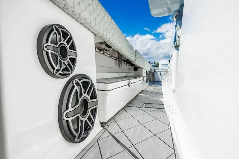 Slide: The Image of 2023 HCB 53 Suenos boat interior with speakers and sleek design. - 98