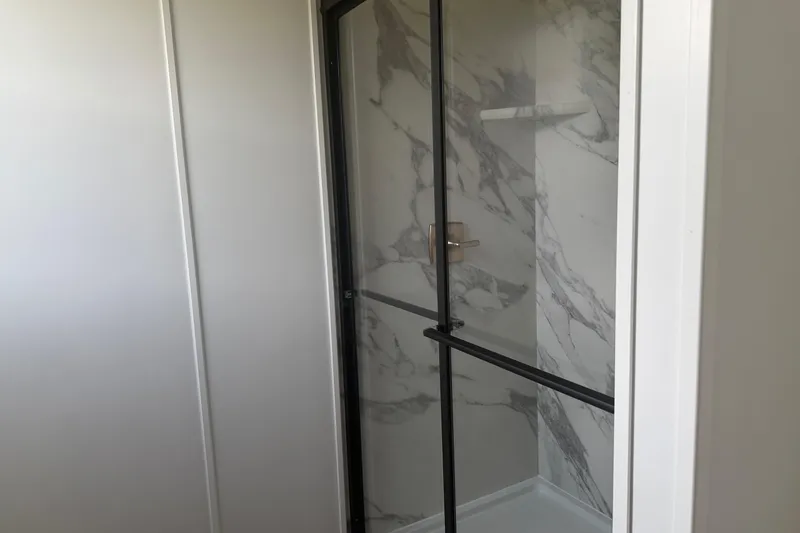 Slide: The Image of Modern shower with marble walls in 2026 Sumerset Voyager. - 19