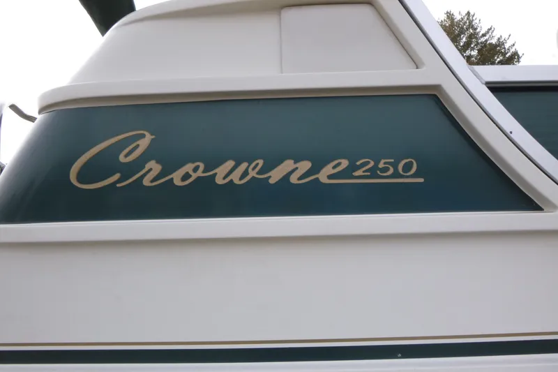 Slide: The Image of 2006 Harris FloteBote Crowne 250 boat side view with logo. - 15