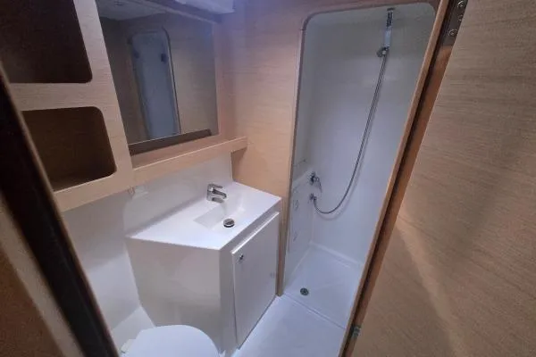 Slide: The Image of Modern bathroom in 2018 Lagoon 42 yacht with shower and sink. - 14