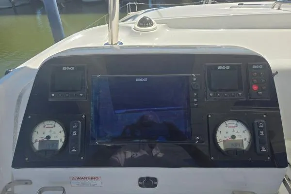 Slide: The Image of Control panel of a 2018 Lagoon 42 catamaran with navigation instruments. - 16