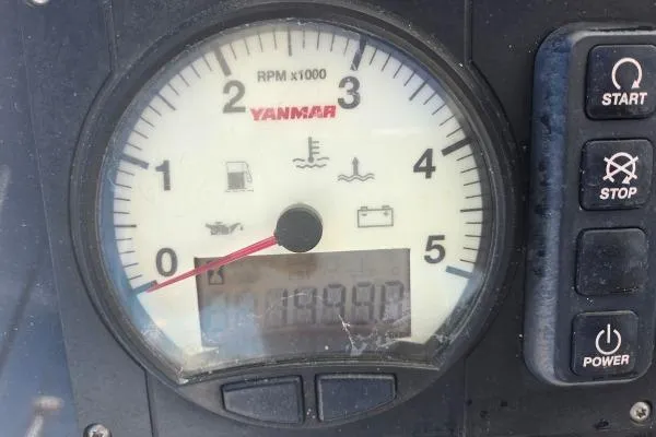 Slide: The Image of Yanmar RPM gauge on 2018 Lagoon 42, displaying engine hours and control buttons. - 26