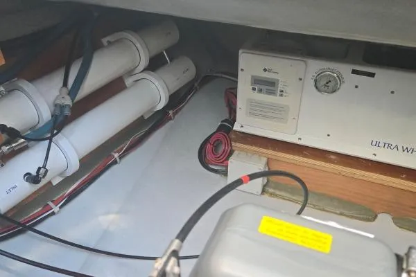 Slide: The Image of Engine compartment of a 2018 Lagoon 42 catamaran with water filtration system. - 30