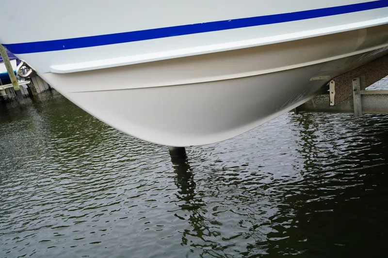 Slide: The Image of Stuart 26 boat hull above water, showcasing sleek design, 2015 model. - 20