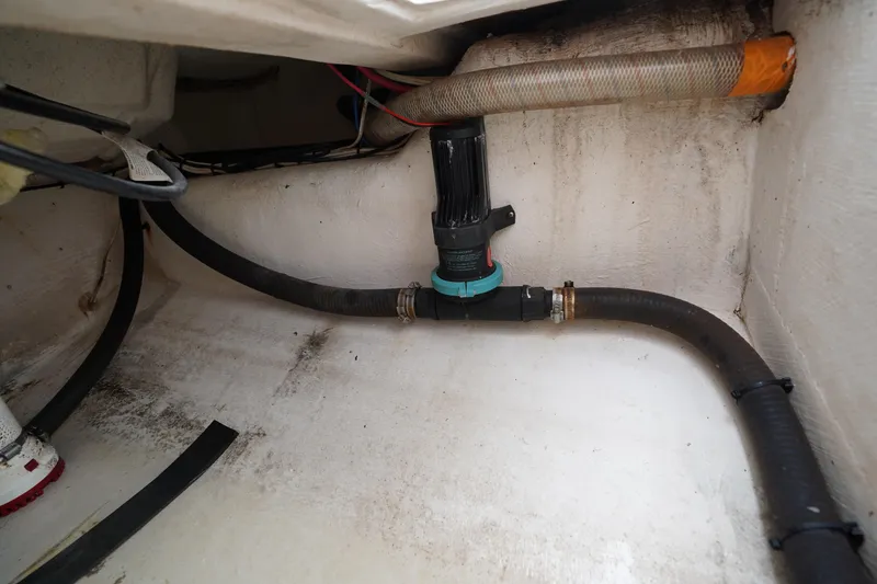 Slide: The Image of Boat bilge area with hoses and pump, Stuart 26 model, 2015. - 33
