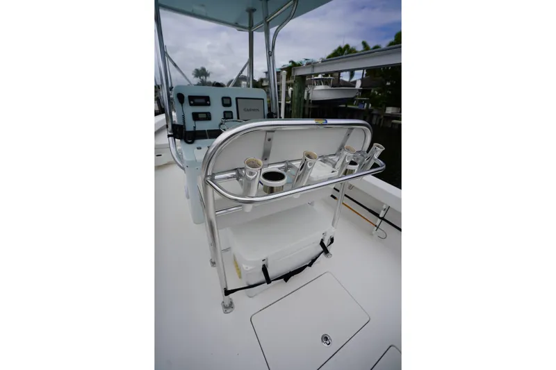 Slide: The Image of Stuart 26 boat console with rod holders and Garmin electronics, 2015 model. - 38
