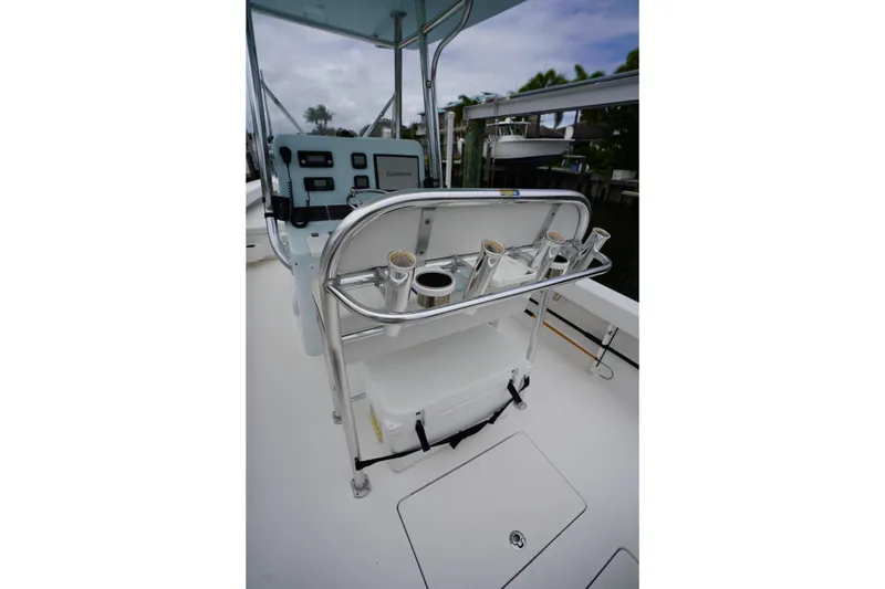Slide: The Image of Stuart 26 boat console with rod holders and Garmin electronics, 2015 model. - 39