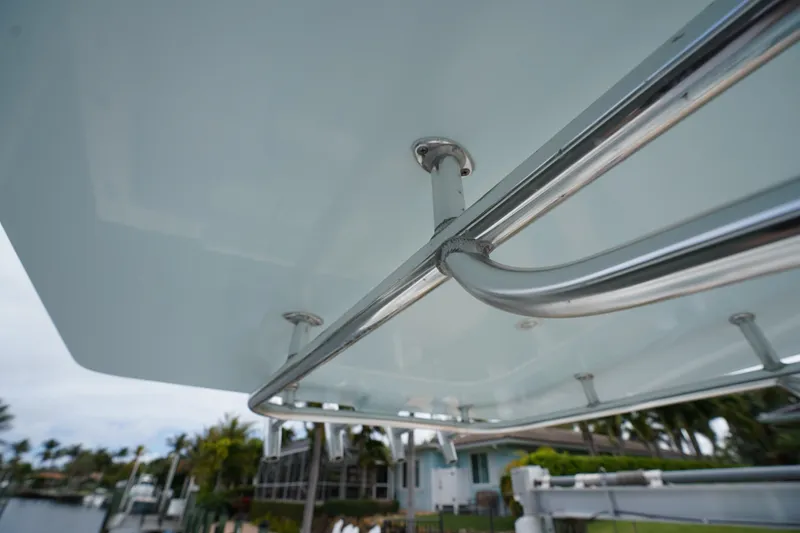 Slide: The Image of Close-up of a 2015 Stuart 26 boat's metal railing and canopy structure. - 40