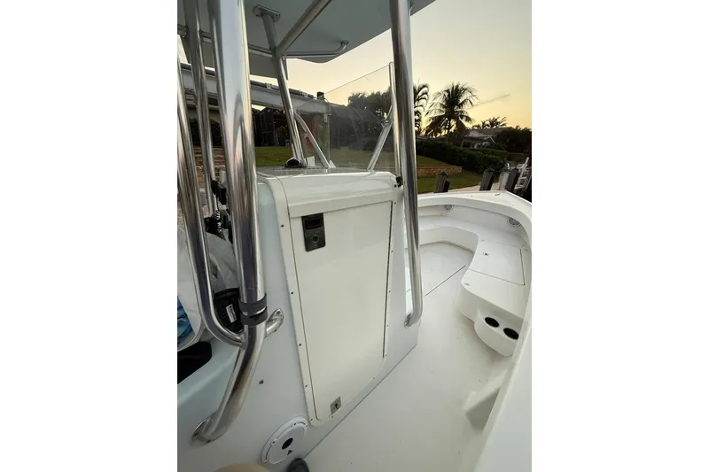 Slide: The Image of 2015 Stuart 26 boat interior with sleek design and stainless steel features. - 8