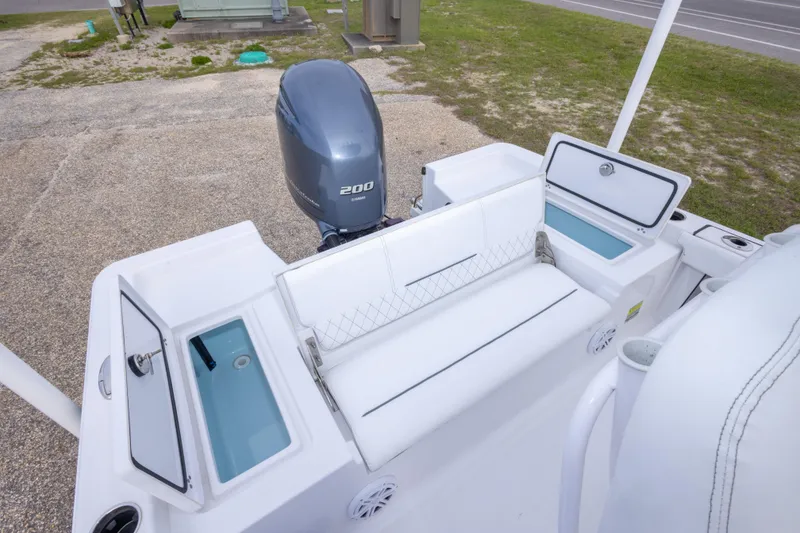 Slide: The Image of 2023 Sportsman Masters 227 Bay Boat with Yamaha 200 engine, featuring spacious seating and storage. - 24