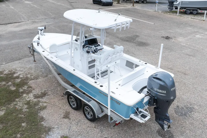 Slide: The Image of 2023 Sportsman Masters 227 Bay Boat with Yamaha engine on trailer. - 26