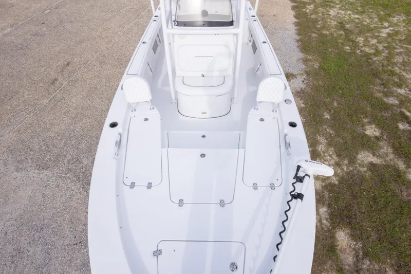 Slide: The Image of 2023 Sportsman Masters 227 Bay Boat interior view, showcasing seating and storage compartments. - 39