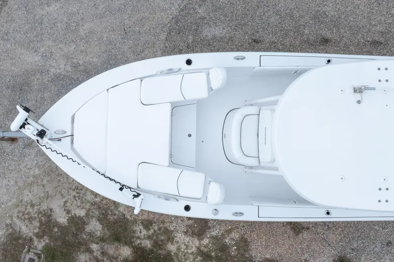 Slide: The Image of Overhead view of 2023 Sportsman Masters 227 Bay Boat on gravel surface. - 4