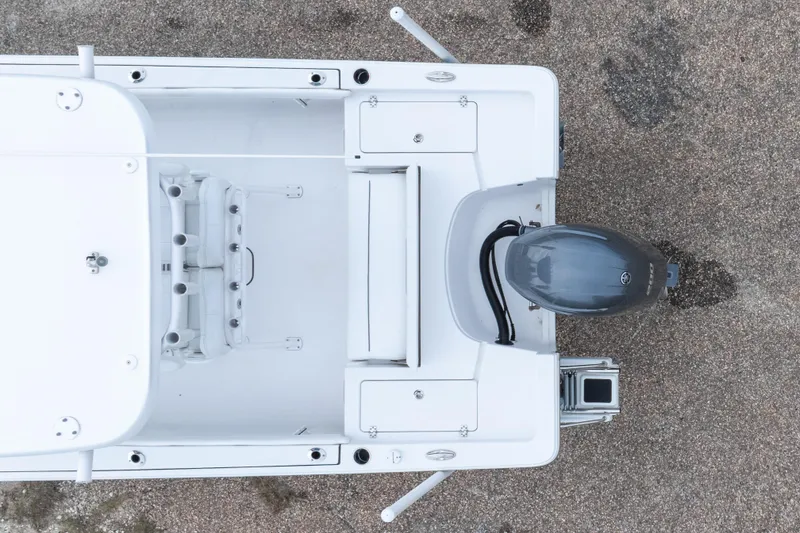 Slide: The Image of Overhead view of 2023 Sportsman Masters 227 Bay Boat with outboard motor. - 5