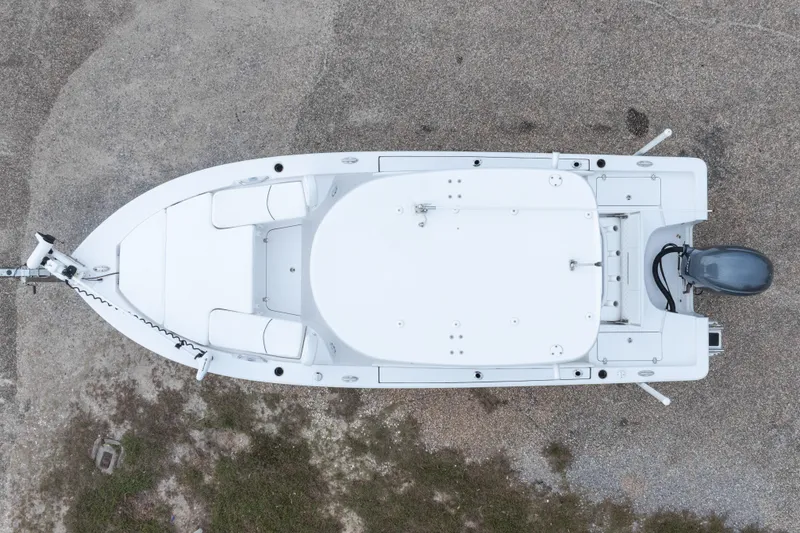 Slide: The Image of Overhead view of 2023 Sportsman Masters 227 Bay Boat on concrete surface. - 7
