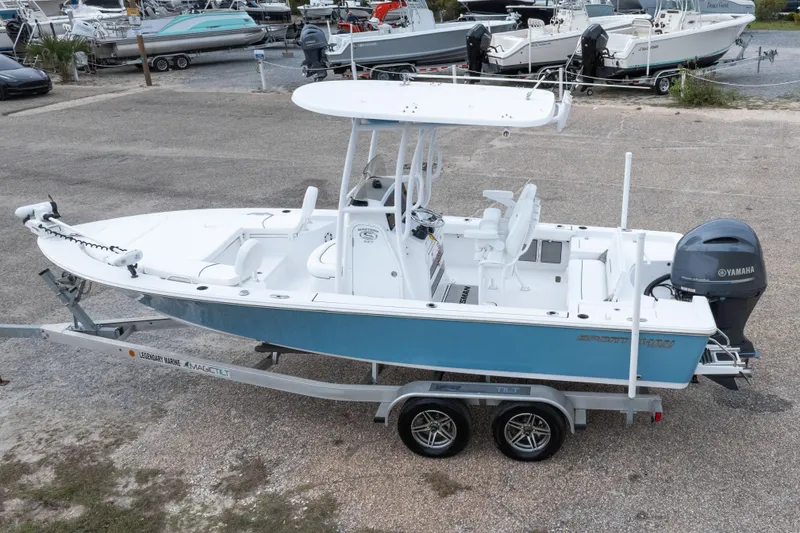 Slide: The Image of 2023 Sportsman Masters 227 Bay Boat on trailer, featuring Yamaha outboard motor. - 9