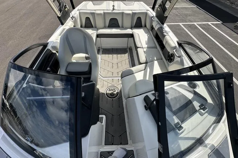 Slide: The Image of 2018 Malibu Wakesetter 21 VLX boat interior with spacious seating and sleek design. - 27