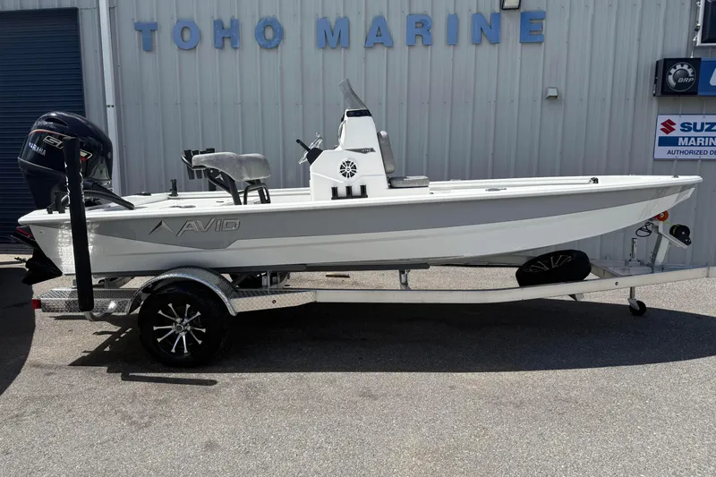 The Image of 2026 Avid 19 FSX boat on trailer at Toho Marine dealership. - 1