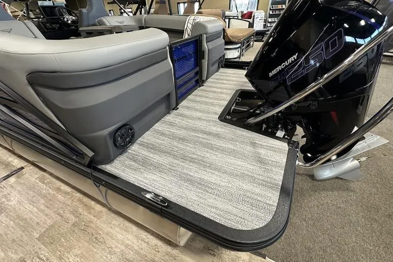Slide: The Image of 2026 Bennington 24 M Quad Bench boat interior with Mercury 250 engine. - 15