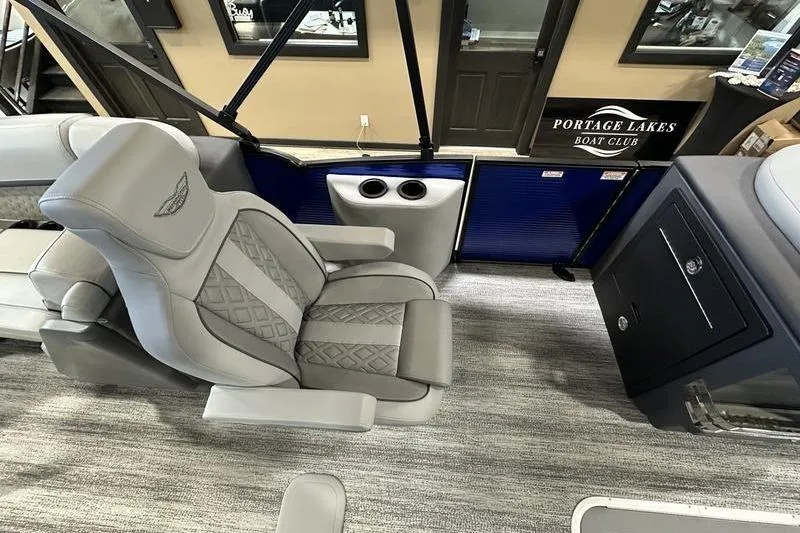 Slide: The Image of Luxurious interior of 2026 Bennington 24 M Quad Bench pontoon boat with plush seating. - 17