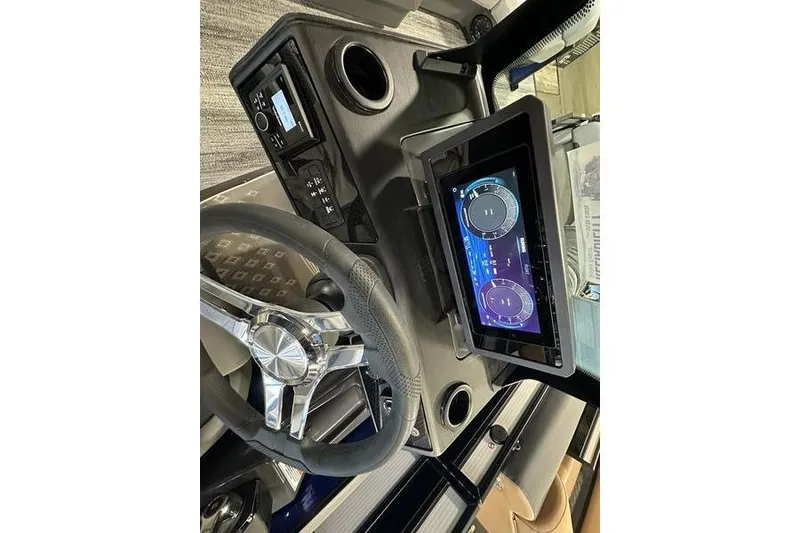 Slide: The Image of Interior view of 2026 Bennington 24 M Quad Bench boat. - 26