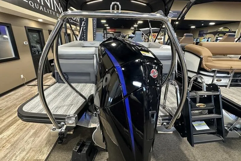 Slide: The Image of 2026 Bennington 24 M Quad Bench pontoon boat with powerful outboard motor. - 5