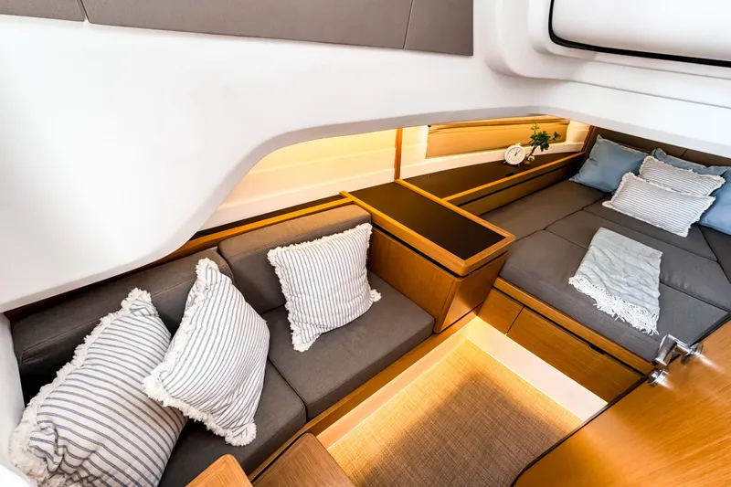 Slide: The Image of Luxurious interior of 2025 Aiata Wayfinder 38 Open yacht with cozy seating and elegant decor. - 17