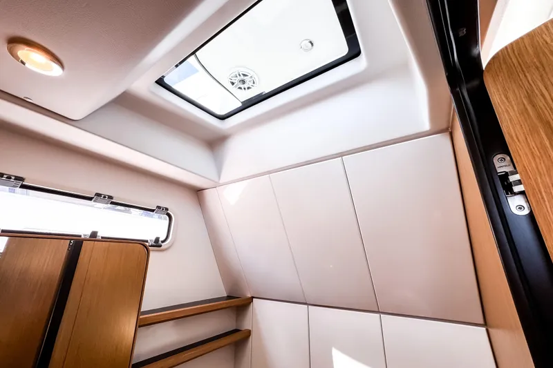 Slide: The Image of Interior view of 2025 Aiata Wayfinder 38 Open, featuring modern design and skylight. - 21