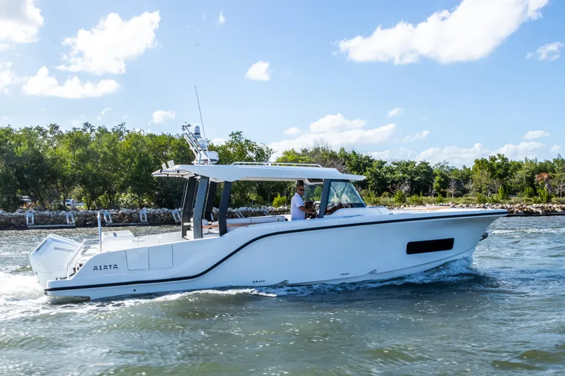 Slide: The Image of Aiata Wayfinder 38 Open 2026 on water, sunny day. - 6