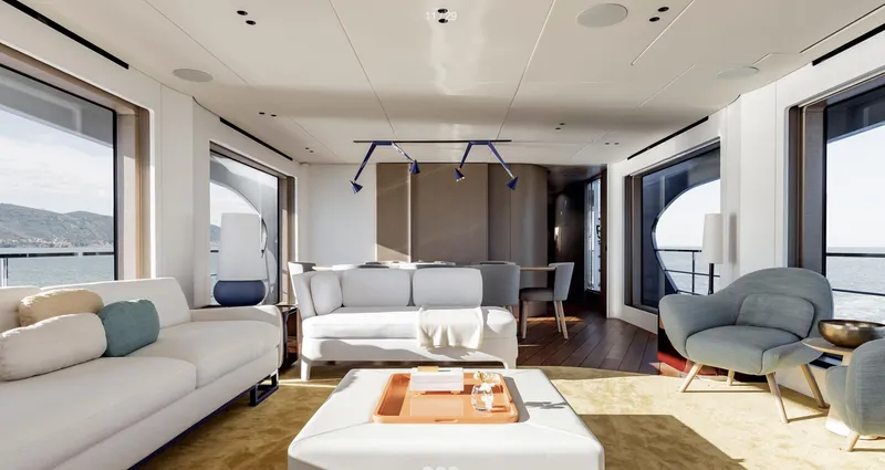 Slide: The Image of Luxurious interior of 2025 Azimut Grande 26M yacht with modern furnishings and large windows. - 12