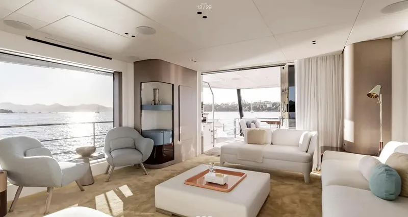 Slide: The Image of Luxurious interior of 2025 Azimut Grande 26M yacht with elegant seating and ocean view. - 14