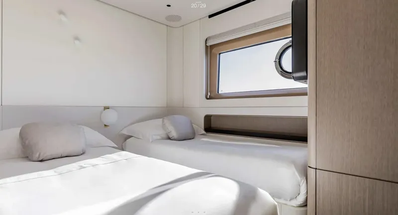 Slide: The Image of Luxurious cabin interior of 2025 Azimut Grande 26M yacht with twin beds. - 21