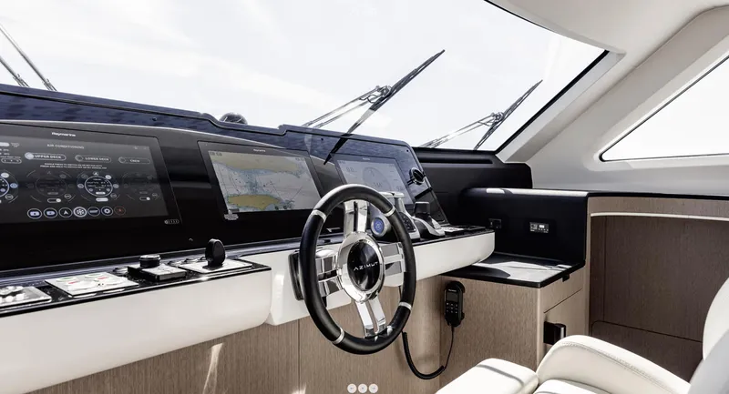 Slide: The Image of Luxurious helm of 2025 Azimut Grande 26M yacht with advanced navigation systems. - 23
