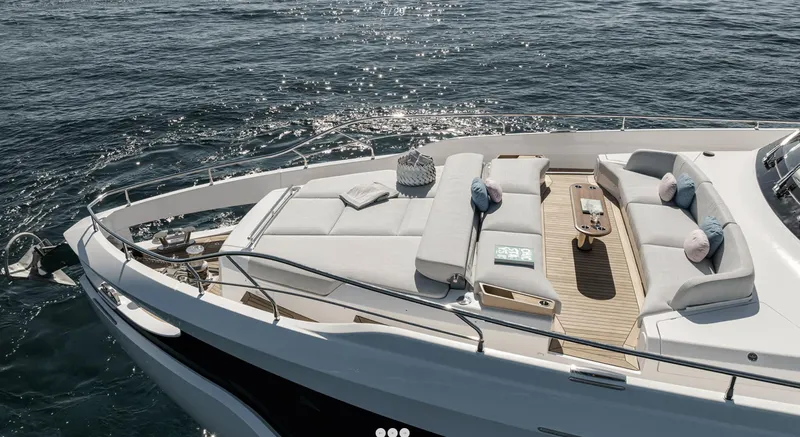 Slide: The Image of Luxurious 2025 Azimut Grande 26M yacht with elegant deck seating on open water. - 9