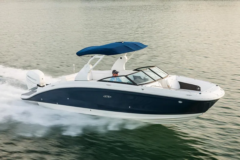 The Image of 2021 Sea Ray SDX 270 Outboard boat on trailer, parked outdoors. - 0