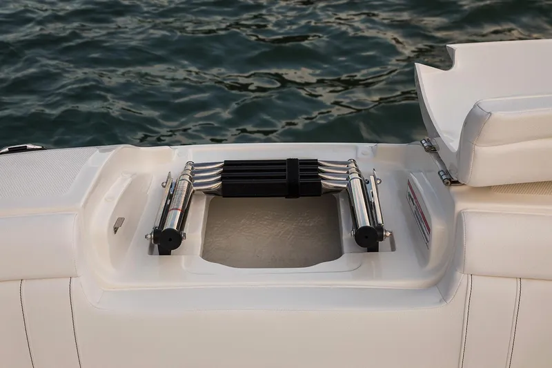 Slide: The Image of Interior of 2021 Sea Ray SDX 270 Outboard boat with spacious seating and table. - 11