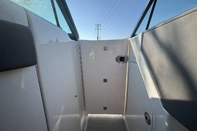 Slide: The Image of Interior view of 2021 Sea Ray SDX 270 Outboard boat, featuring sleek design elements. - 27