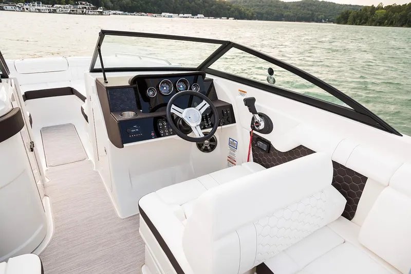 Slide: The Image of 2021 Sea Ray SDX 270 Outboard boat on trailer, featuring Mercury engine. - 5