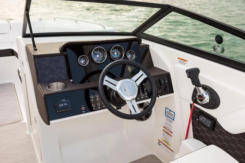 Slide: The Image of 2021 Sea Ray SDX 270 Outboard boat with spacious sunpad and sleek design. - 6