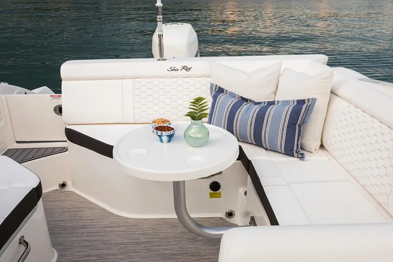 Slide: The Image of 2021 Sea Ray SDX 270 Outboard boat interior with spacious seating and modern design. - 8
