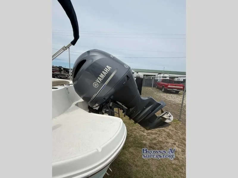 Slide: The Image of 2018 Stingray 206 boat with Yamaha outboard motor. - 5