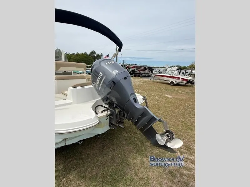 Slide: The Image of 2018 Stingray 206 boat with Yamaha outboard motor. - 6
